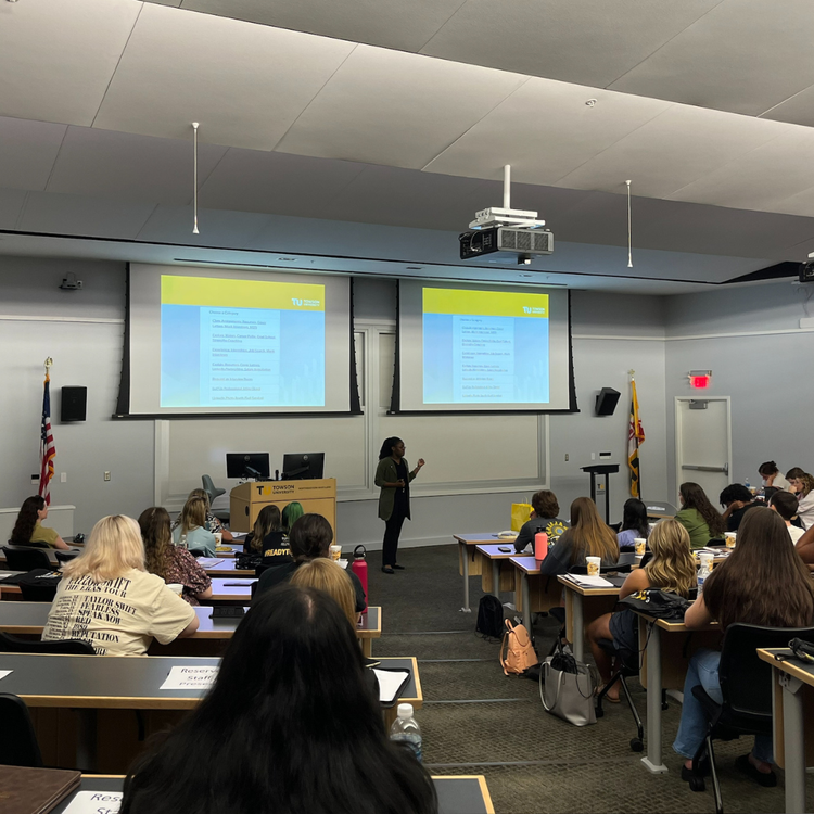 Leading a campus workshop, walking new students through career resources and next steps.